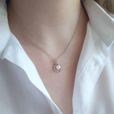 Λευκόχρυσο κολιέ Κ14 με μαργαριτάρι και ζιργκόν