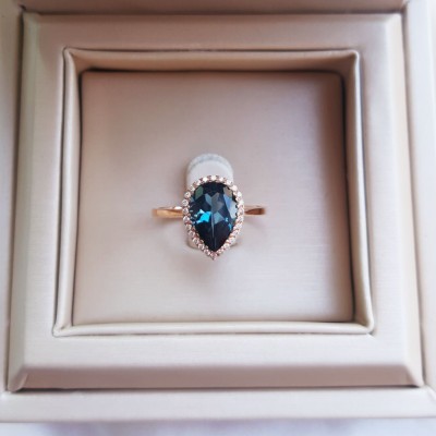 Δαχτυλίδι από ροζ χρυσό Κ18 με διαμάντια και London Blue Topaz