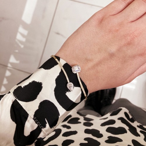 Χρυσό βραχιόλι-χειροπέδα Κ14 με ζιργκόν