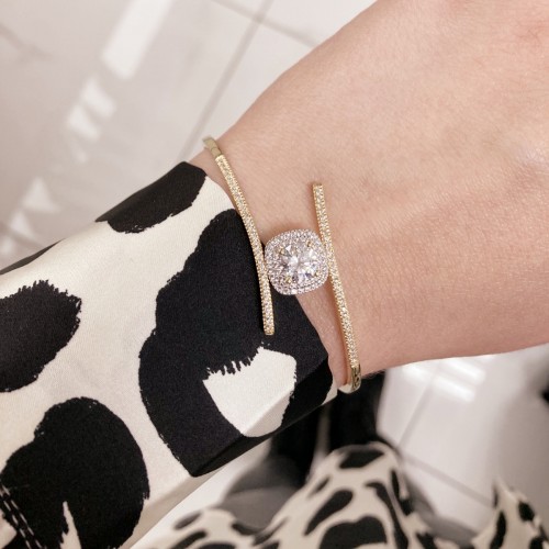 Χρυσό βραχιόλι-χειροπέδα Κ14 με ζιργκόν